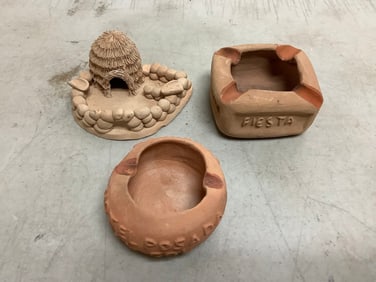 Vintage clay ashtrays(1.5in.tallest)