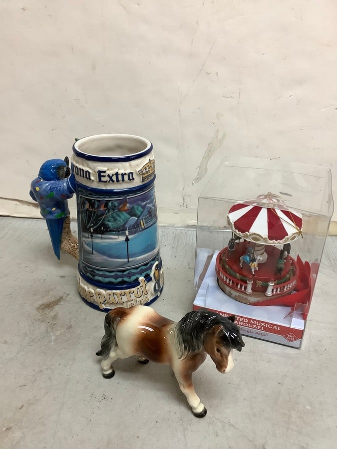 Mr. Christmas animated musical carousel, Corona beer mug(7in.tall), and Goebel ceramic statue (1 of 1)