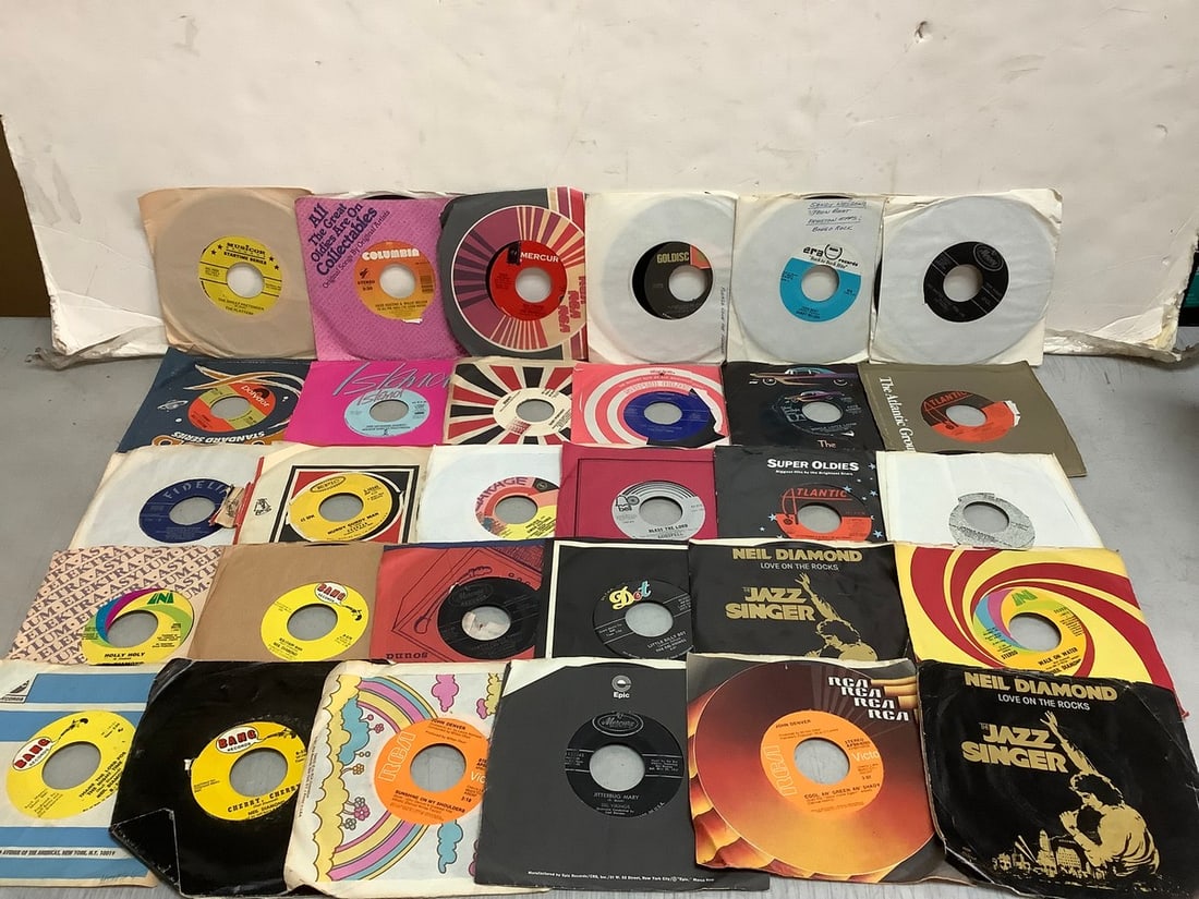 Vintage 45's(Sandy Nelson, The Platters, Genesis, James Brown, and more) (1 of 1)