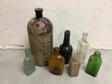 Vintage glass bottles(11.75in.tallest)