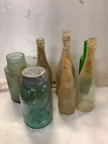 Vintage glass bottles(10.25in.tallest)