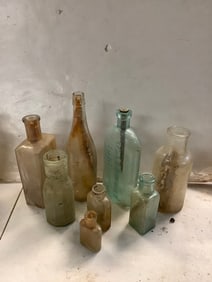 Vintage glass bottles(9.75in.tallest)