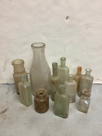 Vintage glass bottles(9.5in.tallest)