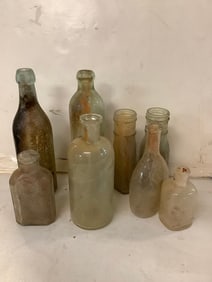 Vintage glass bottles(9.5in.tallest)