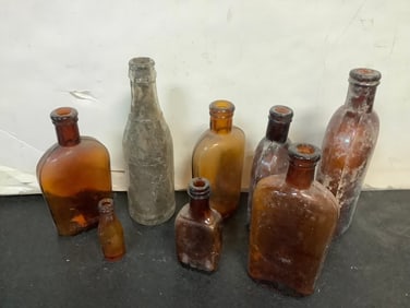 Vintage glass bottles(7.75in.tallest)
