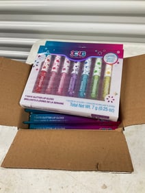 case full of 7 day glitter lip gloss new in the package set of 6