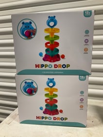 set of 2 hippo drop toys new in the package
