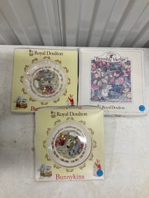 lot of three royal doulton plates in the box