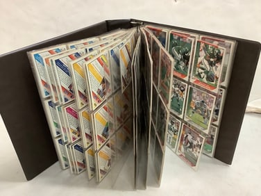 Football card album full of collectible cards