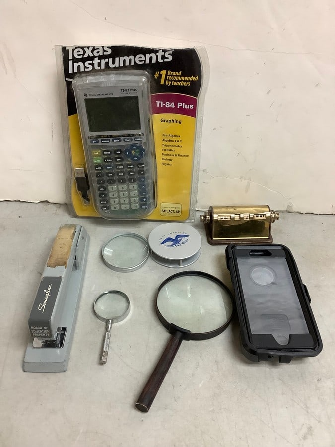TI-83 Plus Graphing Calculator, Magnifying Glasses, Phone Case, Stapler, and more (1 of 1)