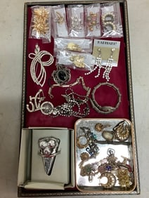 Various costume jewelry(clip on earrings, necklaces, pins, and more)