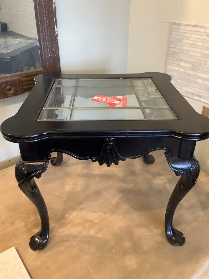 Square glass top table with carved wood frame(30in.x30in.x24in.-glass top slighty damaged): Square glass top table with carved wood frame(30in.x30in.x24in.-glass top slighty damaged)