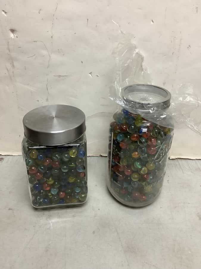 Glass jars of marbles(tallest jar 10in.): Glass jars of marbles(tallest jar 10in.)