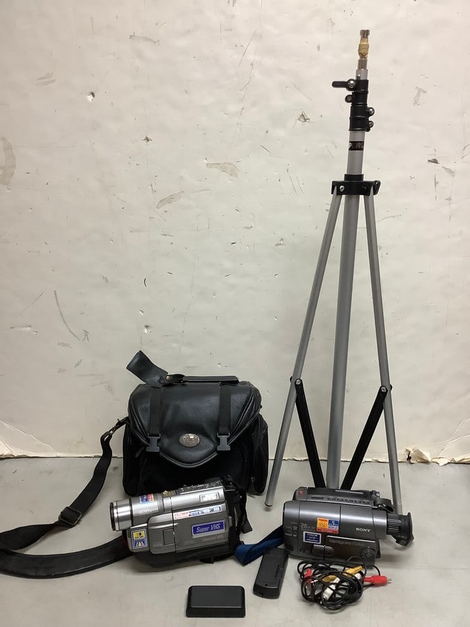 JVC and Sony camcorder, tripod(about 34in.tall, adjustable), and camera carrying case (1 of 1)