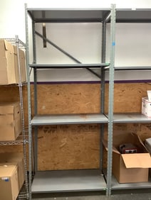 Metal shelving unit(7ft.x3ft.x18in.)
