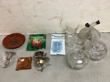 Glass container with lid, brass doorknob with key, butterfly decor, and more(5.25in.tallest)