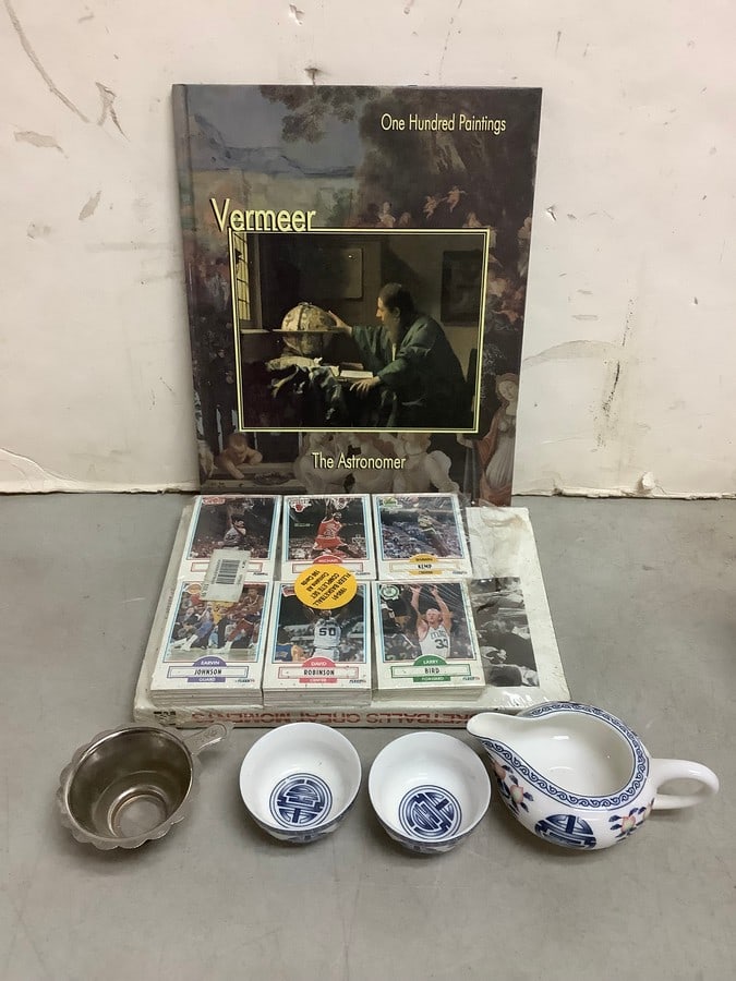 Vermeer The Astronomer book, Fleer 90 collectible basketball cards set, and more(tallest 2in.) (1 of 1)