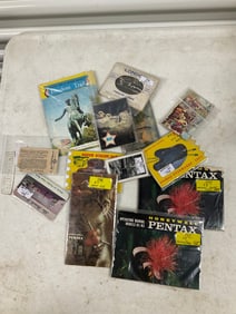 lot of postcards, camera manuals and others