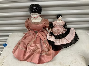 lot of 2 hand painted porcelain dolls tallest is 16"