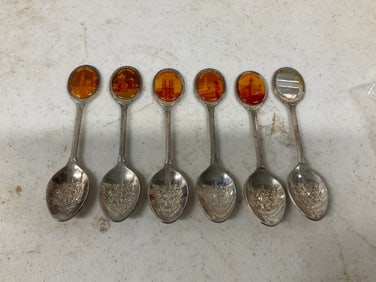 lot of 6 decorative spoons marked silver plated