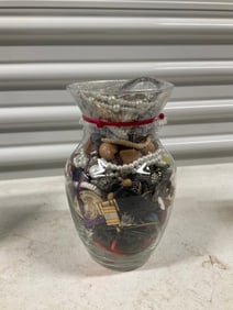 vase full of costume jewelry