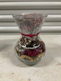 vase full of costume jewelry