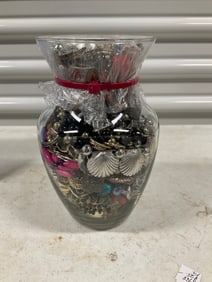 vase full of costume jewelry