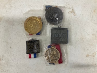 lot of track and field medals