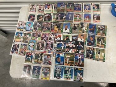 lot of baseball cards of various teams and years