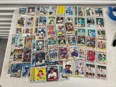 lot of baseball cards of various teams and years