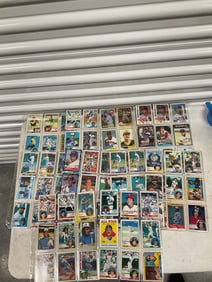 lot of baseball cards of various teams and years