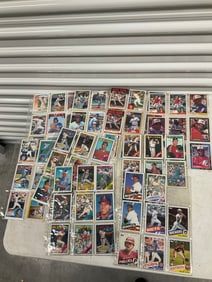 lot of baseball cards of various teams and years