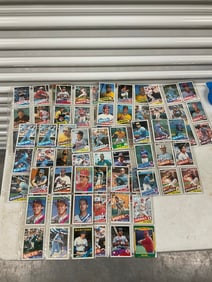 lot of baseball cards of various teams and years