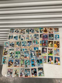 lot of baseball cards of various teams and years