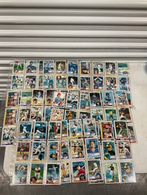 lot of baseball cards of various teams and years