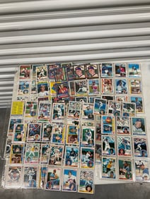 lot of baseball cards of various teams and years