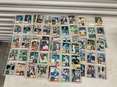 lot of baseball cards of various teams and years