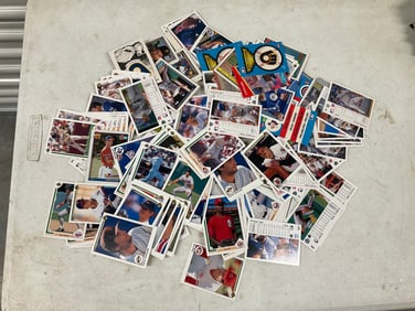 lot of baseball cards of various teams and years
