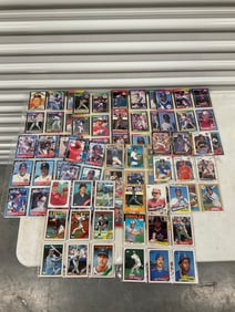 lot of baseball cards of various teams and years