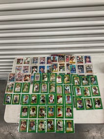 lot of baseball cards of various teams and years
