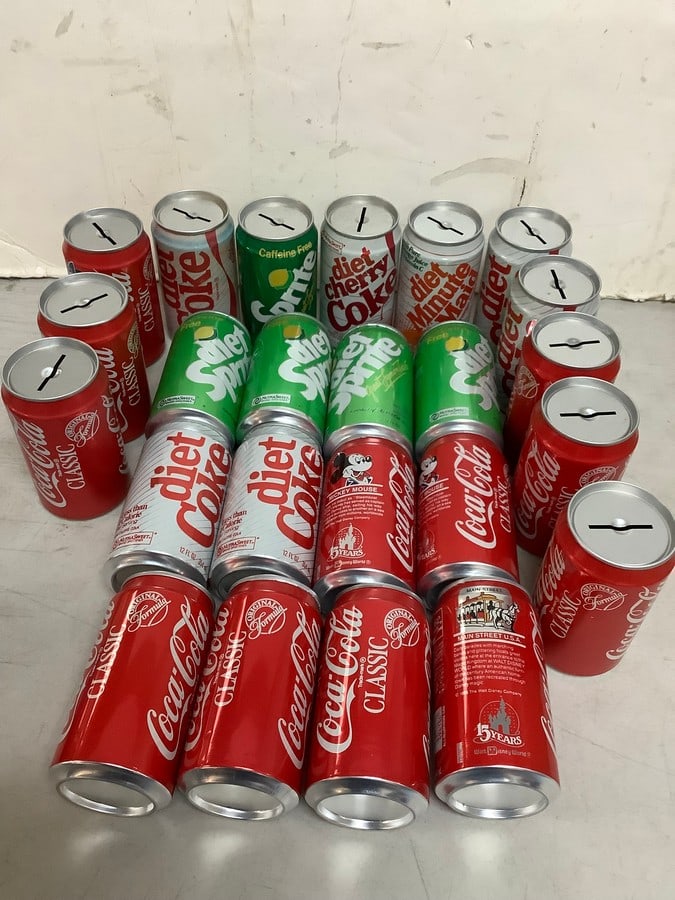 Vintage disney soda can piggy banks about 5in tall: Vintage disney soda can piggy banks about 5in tall