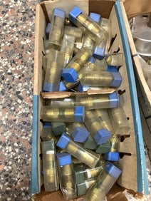 Box full of new brass fittings for oxy acetylene torches