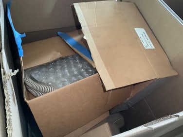 Large box of battery charger rebuild parts