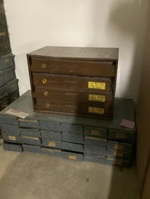 Nut/bolt cabinets loaded with nuts, bolts, and parts