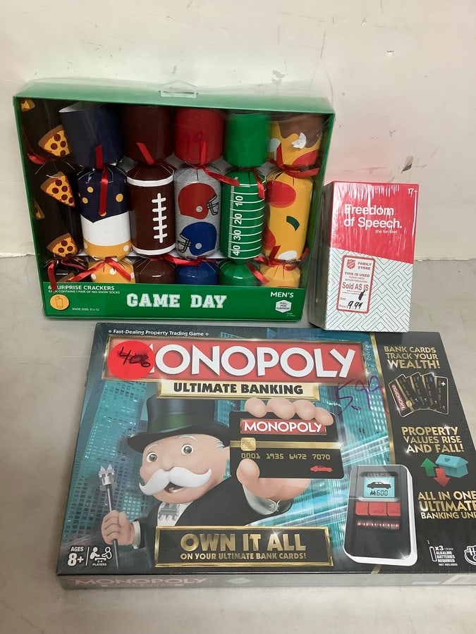 Monopoly game(sealed), Game Day socks/crackers set, and Freedom of Speech game(sealed) (1 of 1)
