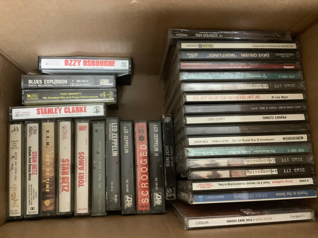 Various DVDs and Casette Tapes (1 of 1)