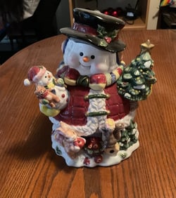 Snowman cookie jar Holding Doll stands 11in