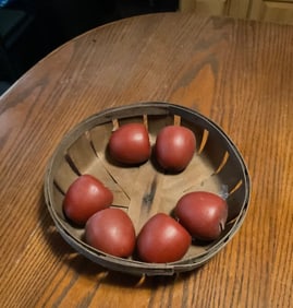 Basket of wooden apples