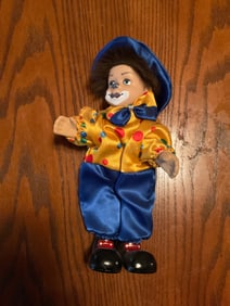 Musical collecible clow perclin doll 12in