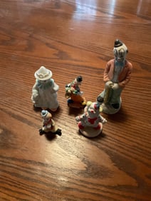 Lot of clown perlcin dolls